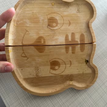 Plato de madera Porland roto tras primera caída