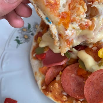 BİM Lezzethane Pizza İçinden Plastik Çıkması Ve İletişim Sorunu