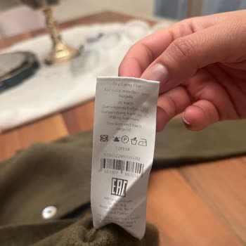 Adil Işık Group Yanlış Yıkama Bilgisi Ve İlgisiz Mağaza: Hırka Kullanılamaz Hale Geldi