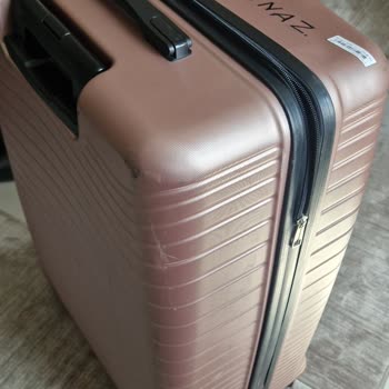 Koffer beschädigt, Rad und Hartschale gerissen auf Qatar Airways Flug