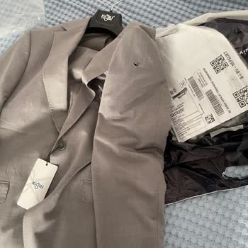 Babalar Günü Hediyesi Takım Elbise Delikli Çıktı