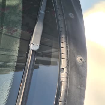 My BMW 1.18i Windshield Trim Is Cracking BMW Must Replace It