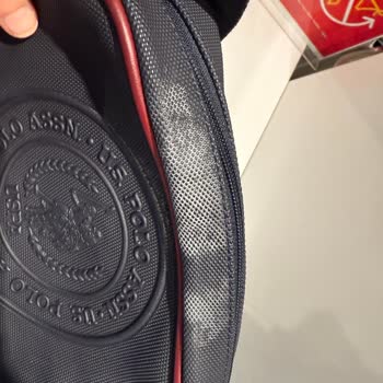 US Polo Çantada Kolonya Teması Sonucu Renk Değişimi Ve Mağaza İlgisizliği