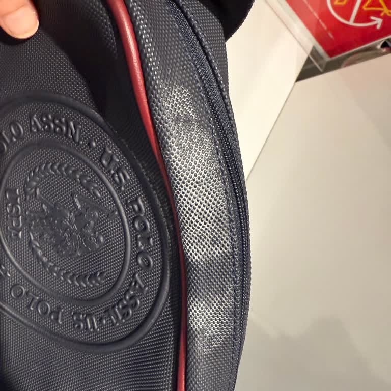 US Polo Çantada Kolonya Teması Sonucu Renk Değişimi Ve Mağaza İlgisizliği