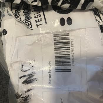 Urgent Request: Wrong Item Returned Due to Shipping Label Mix-Up
