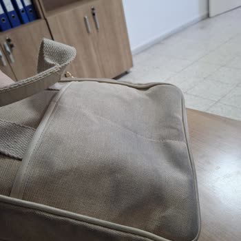Kısa Sürede Renk Değişen Çanta İçin Elle Shoes'tan Olumsuz İnceleme Sonucu
