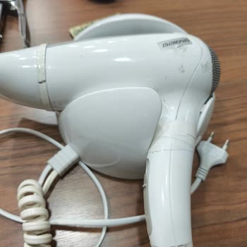 Serviste Onarılan Saç Kurutma Makinesi Kırık Ve Bantlanmış Şekilde Teslim Edildi