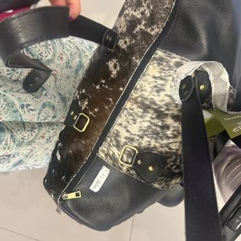 I Report Broken Wheel And Torn Handles On Etihad Luggage After Flight