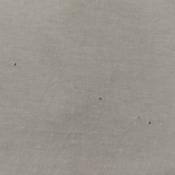 DeFacto T-shirt Daha İlk Giyişte Deliklerle Dolu Çıktı