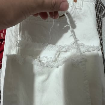 Pantolonun Paçaları Yıkama Sonrası Açıldı, Kısaldı Ve İpleri Sökülüyor