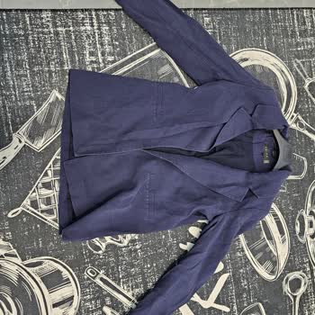 Chima'dan Alınan Takım Elbise Kullanımda Hayal Kırıklığı Yarattı