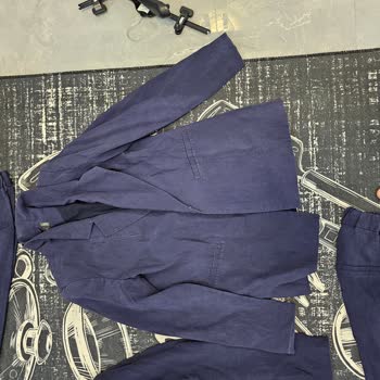 Chima'dan Alınan Takım Elbise Kullanımda Hayal Kırıklığı Yarattı