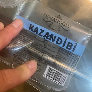 BİM Osmanoğlu Kazandibi Tatlısında Kağıt Benzeri Parçalar Çıktı