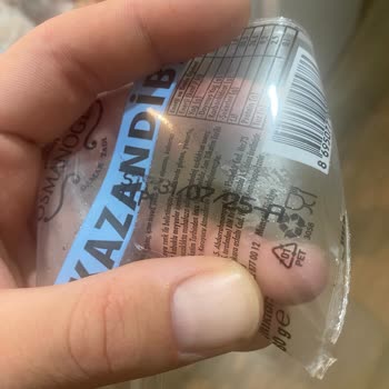 BİM Osmanoğlu Kazandibi Tatlısında Kağıt Benzeri Parçalar Çıktı