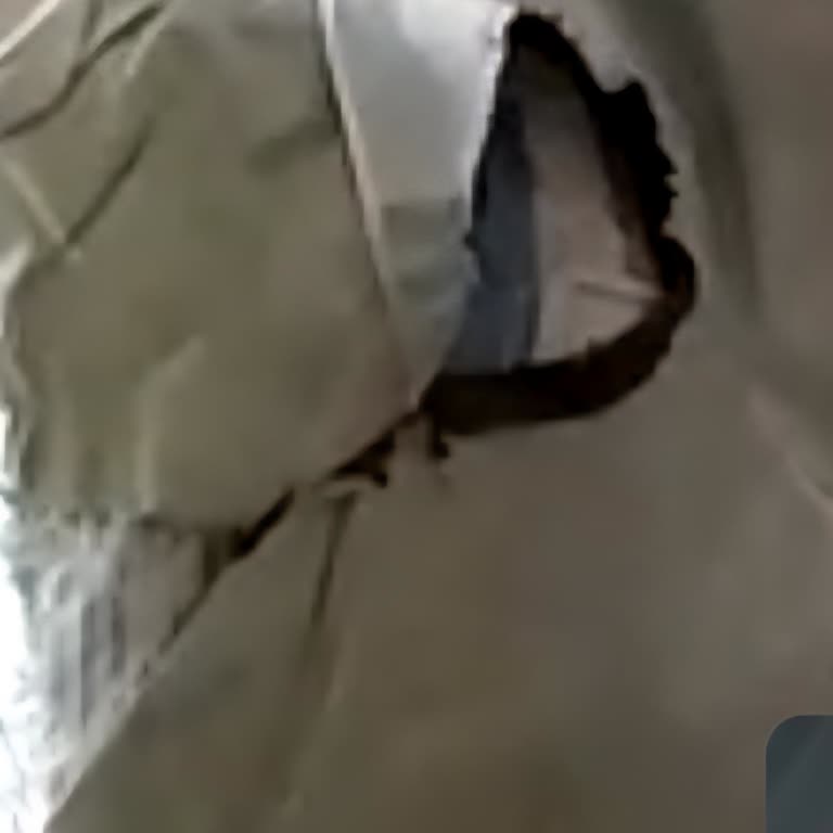 DHL Kuryesi Yırtık Ve Bantlanmış Paketi Düşürerek Teslim Etti