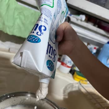 Dost Süt Kapalı Süt Ambalajından Sinek Ve Şüpheli Cisim Çıkması