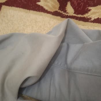 Mavi Kot Pantolonun İlk Yıkamada Diz Kısmında Renk Atması Sorunu