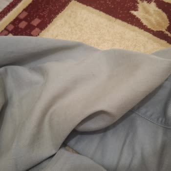 Mavi Kot Pantolonun İlk Yıkamada Diz Kısmında Renk Atması Sorunu