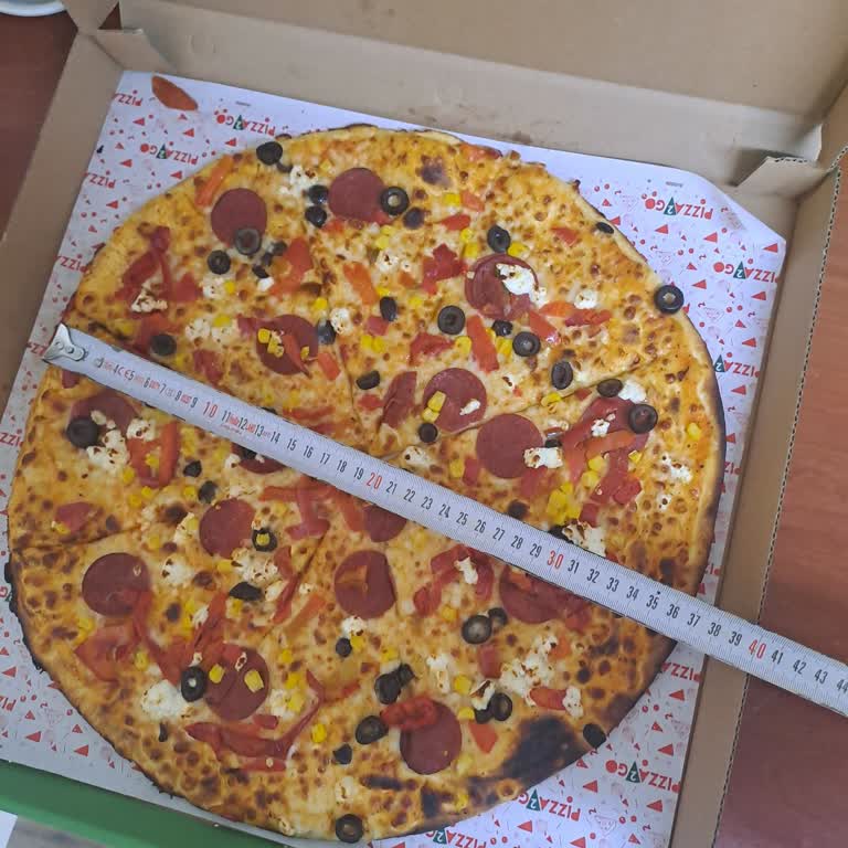 Sipariş Edilen Boyutta Olmayan Pizza Ve Yetersiz Müşteri Hizmeti
