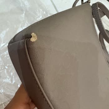 Calvin Klein Çantada Kısa Sürede Deri Atması Ve Garanti Reddi