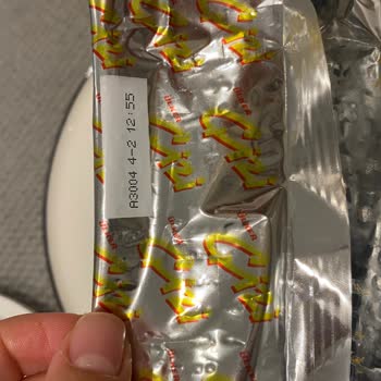 Ülker Çizi'de Yabancı Madde Şoku: Beyaz Tüy Ve Siyah Cisim!