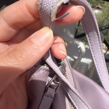 I Face Strap Peeling and Leather Damage on Samsonite Shoulder Bag