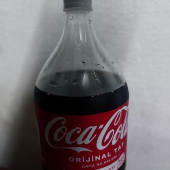 Coca-Cola Şişesinde Tekrar Eden Eksik Dolum Sorunu Mağduriyet Yaratıyor