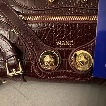 Manc Yeni Alınan Çantada Defolu Metal Buton Ve Yetersiz Müşteri Hizmeti!