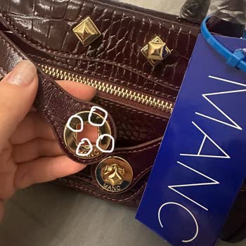 Manc Yeni Alınan Çantada Defolu Metal Buton Ve Yetersiz Müşteri Hizmeti!