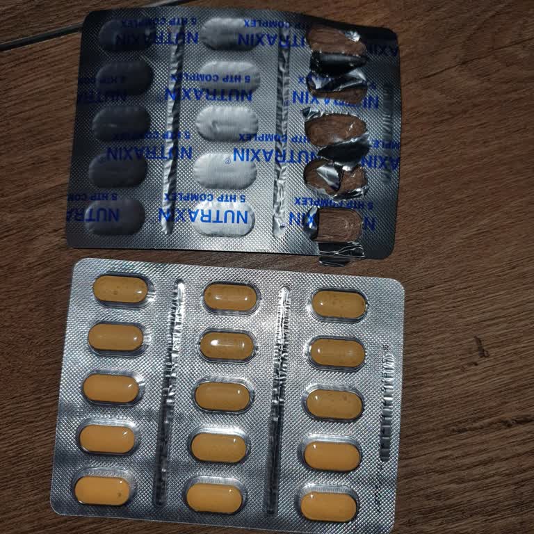 Пятна и посторонние вещества на таблетках Nutraxin 5-HTP Complex