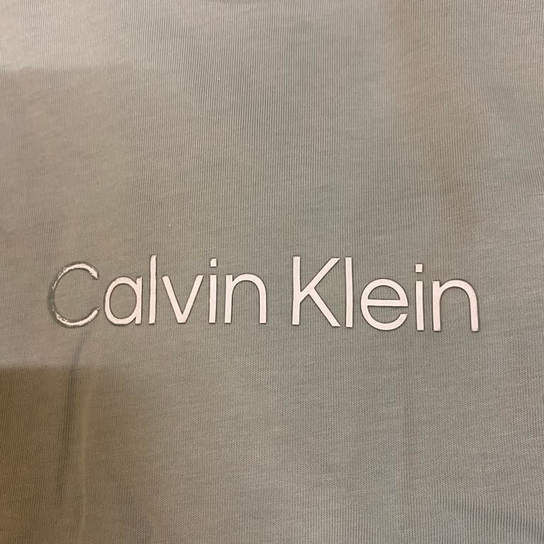 Calvin Klein T-Shirt Print Peeling After One Wash – Warranty Complaint