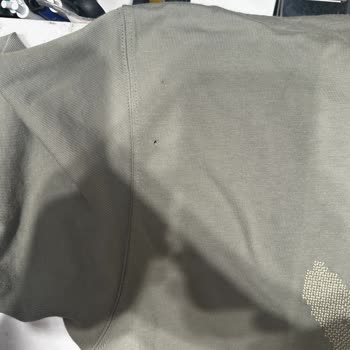 İlk Yıkamada Delinen Nike Tişört İçin Olumsuz İnceleme Sonucu