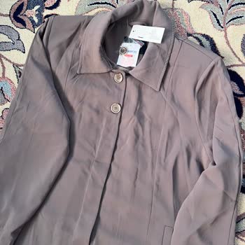 Etiketi Üzerinde Hediye Pardösüde Fişsiz Değişim Sorunu