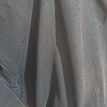 Koyu Lacivert Trençkotun Kısa Sürede Renk Solması Ve Kalite Sorunu