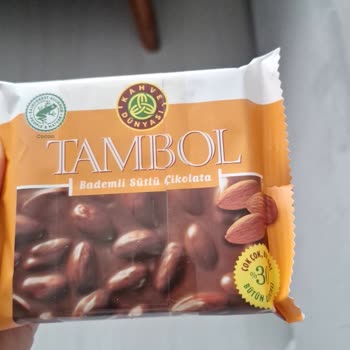 Kahve Dünyası Bademli Çikolata Ambalajında Ek Bant Ve Okunmayan Yazılar