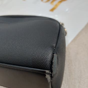 Benetton Shoulder Bag Peeling After Minimal Use - Refund Request