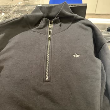 Dockers, camisa se pelusa tras un uso, solicito reembolso