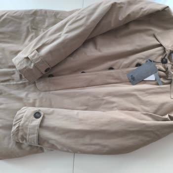 Kirli Ve Kullanılmış Gelen Trençkotta Değişim Yapılmıyor