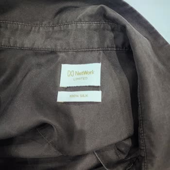 10.000 TL'lik İpek Gömlek İkinci Yıkamada Kullanılamaz Hale Geldi, Mağaza Sorumluluk Almadı