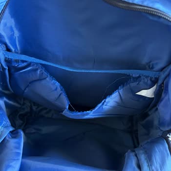 Solicito cambio de mochila escolar GAP por daño interno en poco tiempo