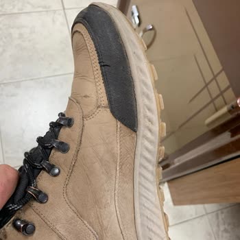 Problemas de calidad con botas de cuero Dockers, solicito cambio o reembolso