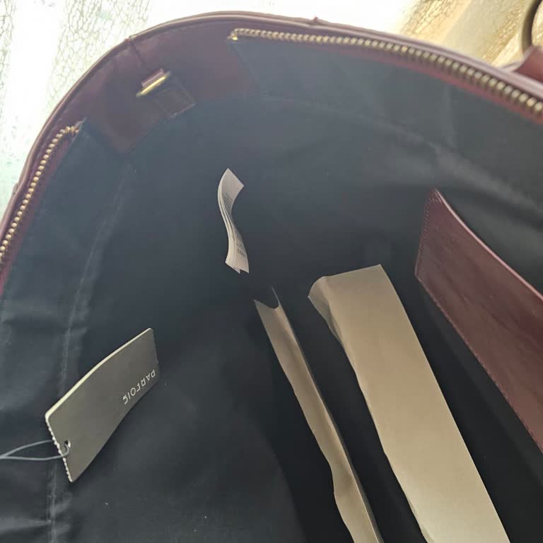 Bolsa Parfois sin correa, reclamo por producto incompleto en la web