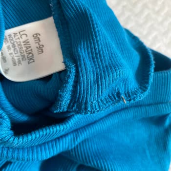 LCW Online'dan Alınan Bebek Giyim Ürününde Tehlikeli Cisim Şoku