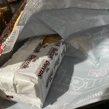 Eti Gıda Üç Küçük Paketten Birinin Paketinin Önceden Açılmış Olması