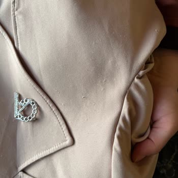 Alvina Online Mağazasında Ayıplı Trençkot Tüylenmesi Ve İade Talebi