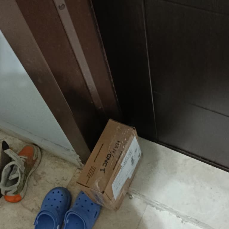 Kapının Önüne Bırakılan Kargo İçin Teslimat Kontrolü Ve Güvenlik İhmalinin Giderilmesi