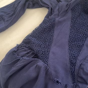 İlk Yıkamada Parçalanan Lacivert Uzun Elbise İçin İade Talebi