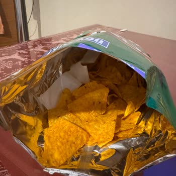 Falta de sabor y textura delgada en Doritos Taco