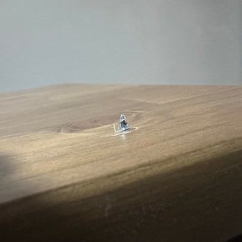 IKEA Tabletop Pierced During Assembly - Screw Hole Defect Claimed User Fault