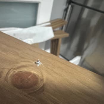 IKEA Tabletop Pierced During Assembly - Screw Hole Defect Claimed User Fault